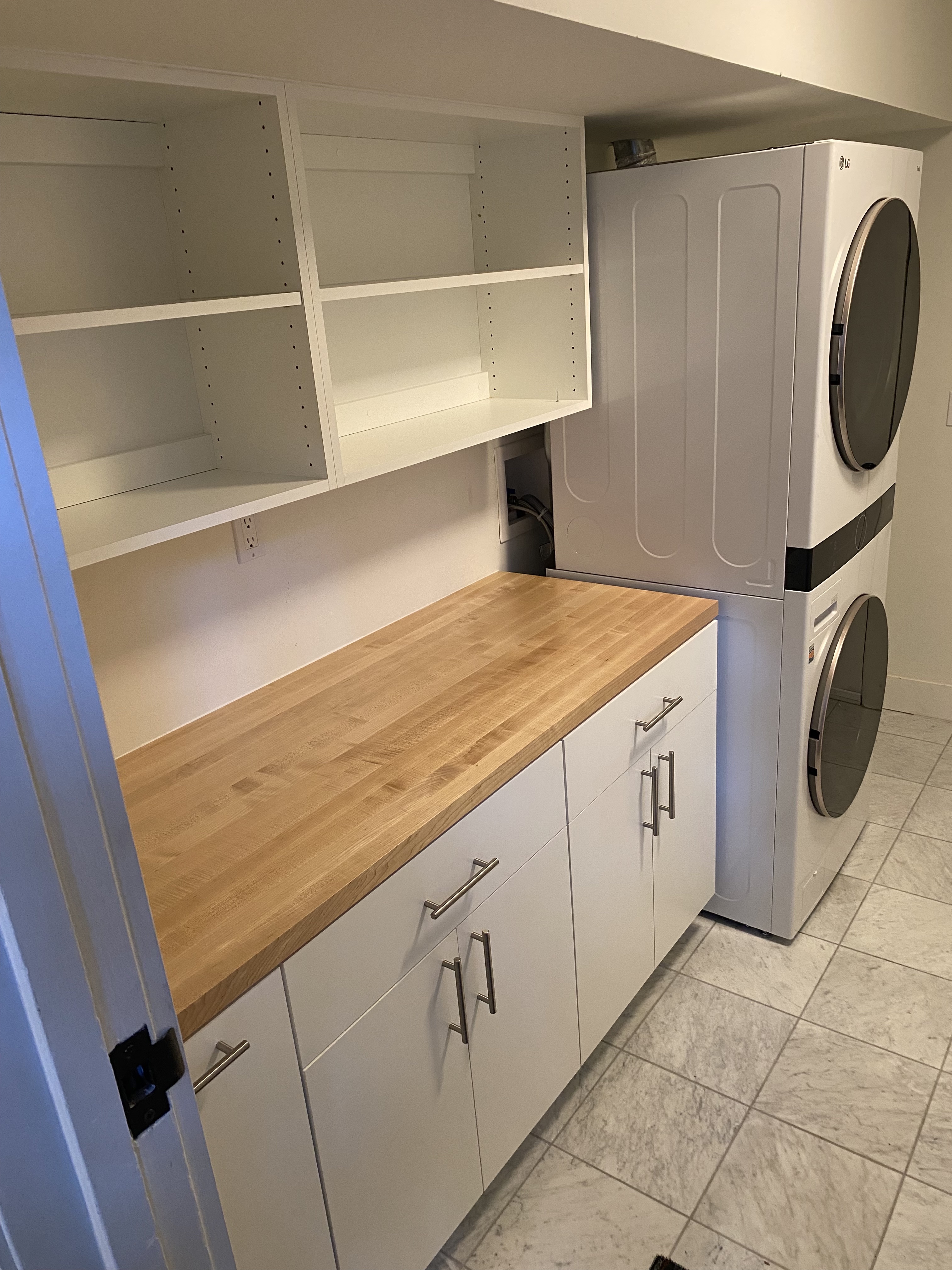 San Francisco Laundry Room with Folding Counter, Storage, Stackable laundry, and more